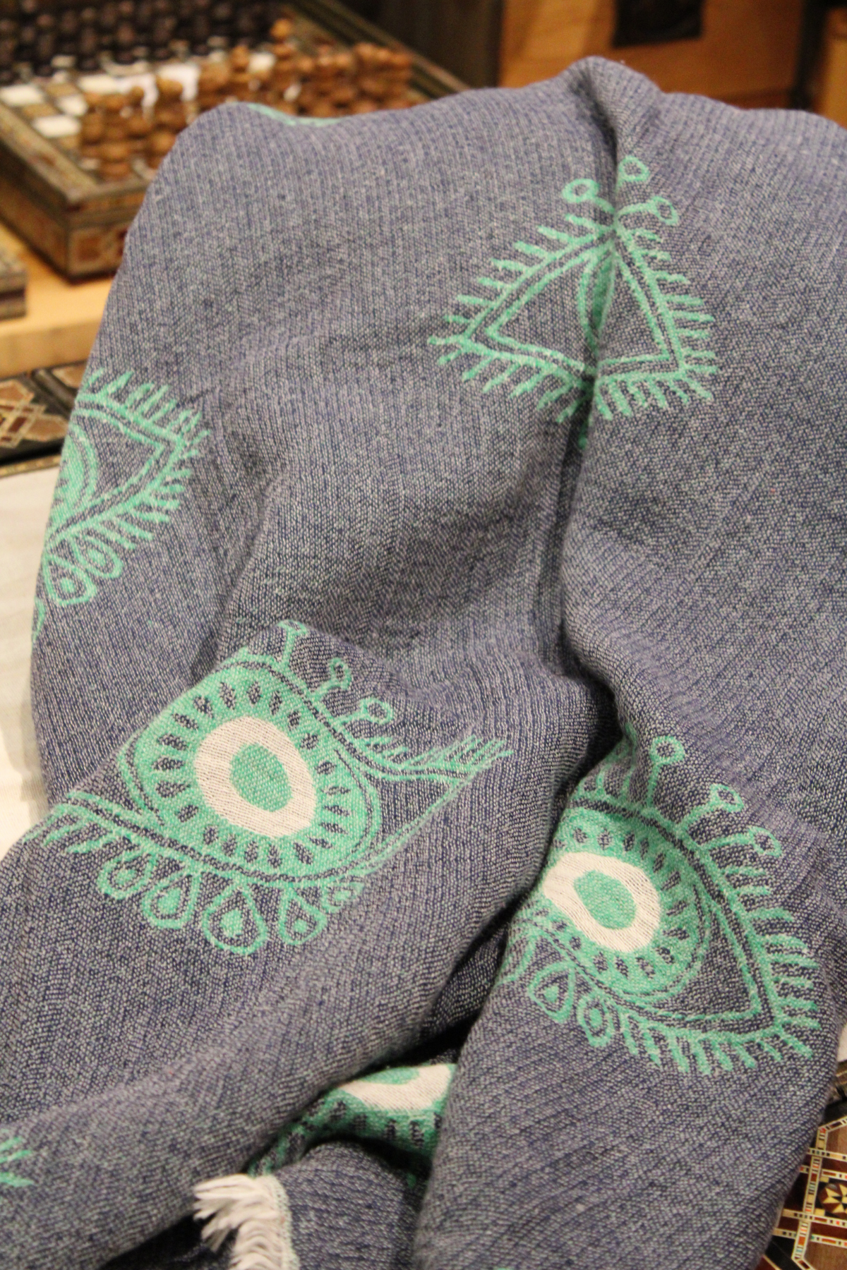 Protection Eye with Green Eye on Dark Blue Turkish Towel