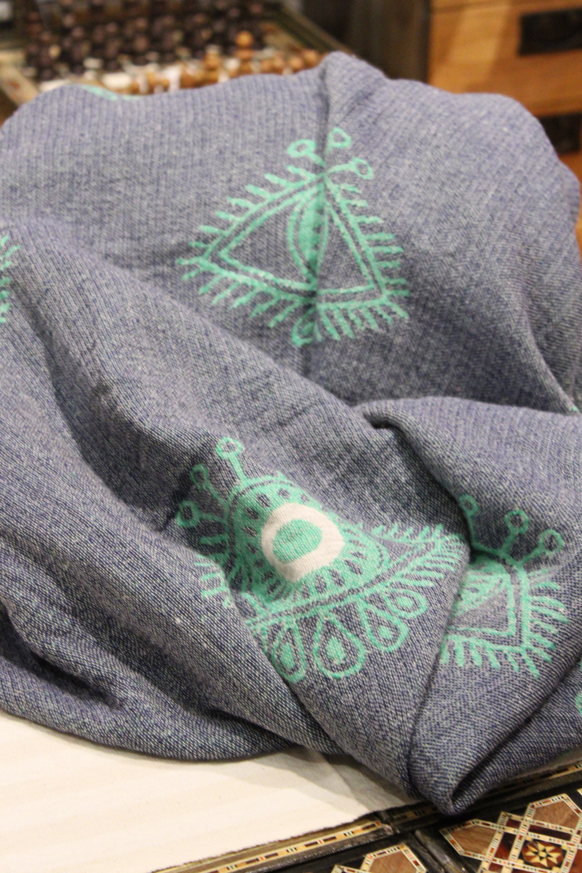 Protection Eye with Green Eye on Dark Blue Turkish Towel