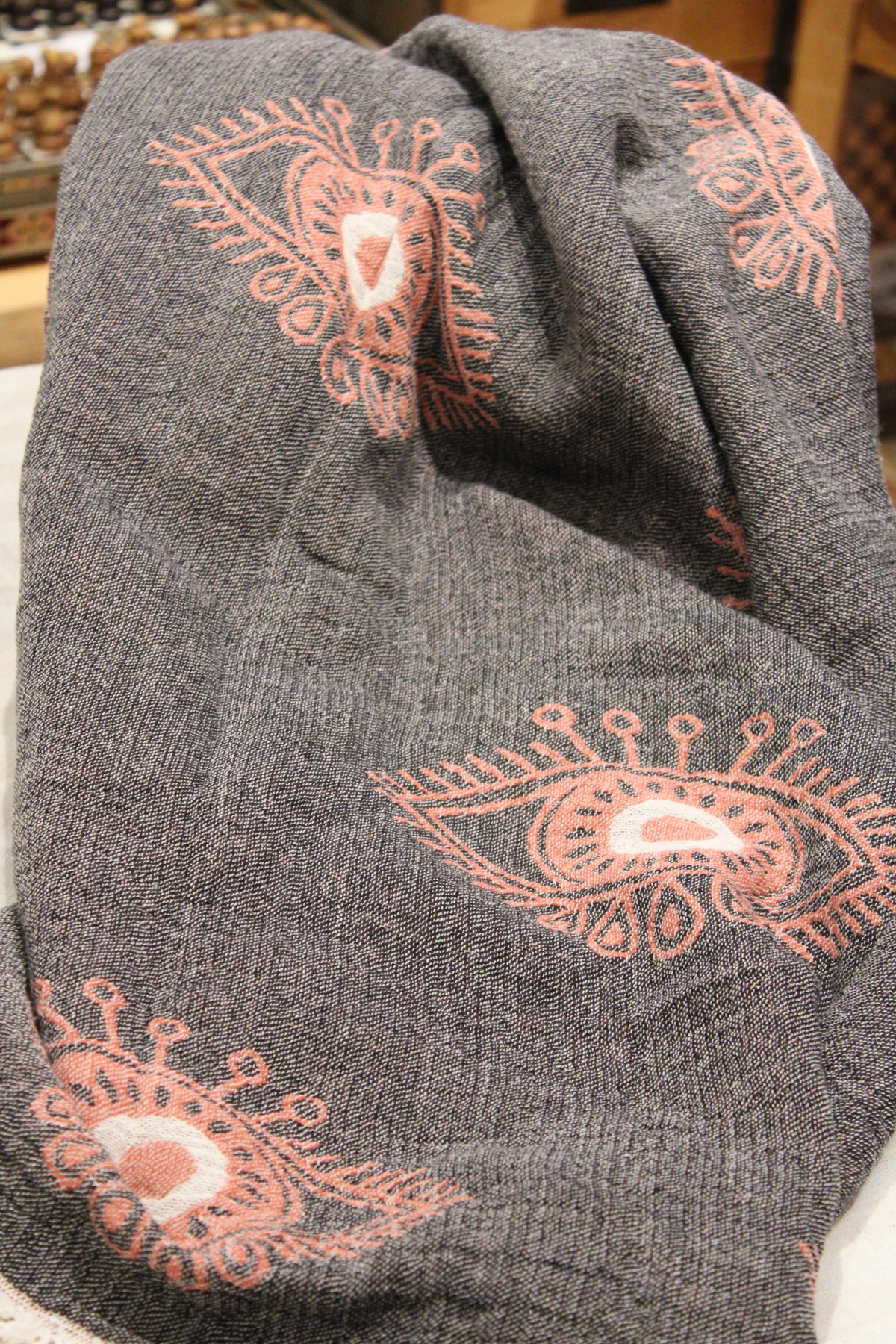 Protection Eye with Coral Eye on Grey Turkish Towel