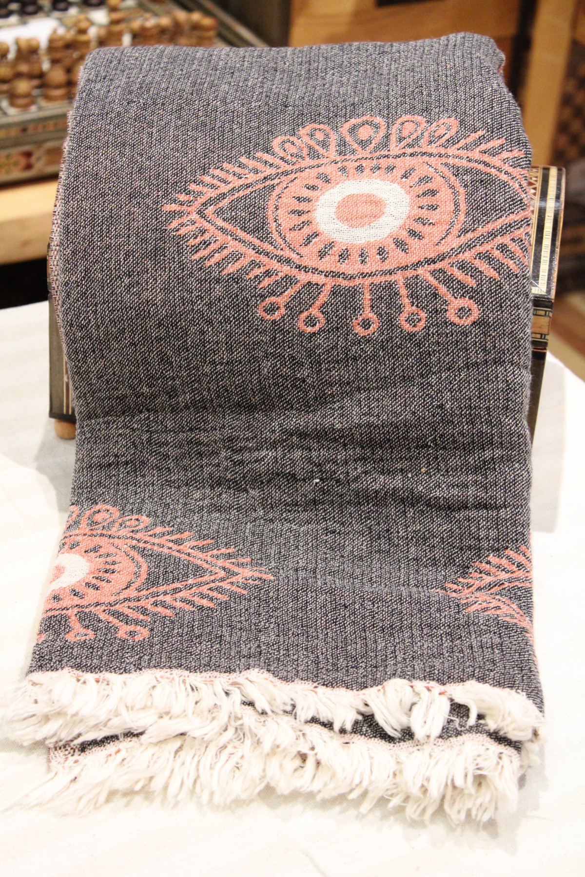 Protection Eye with Coral Eye on Grey Turkish Towel
