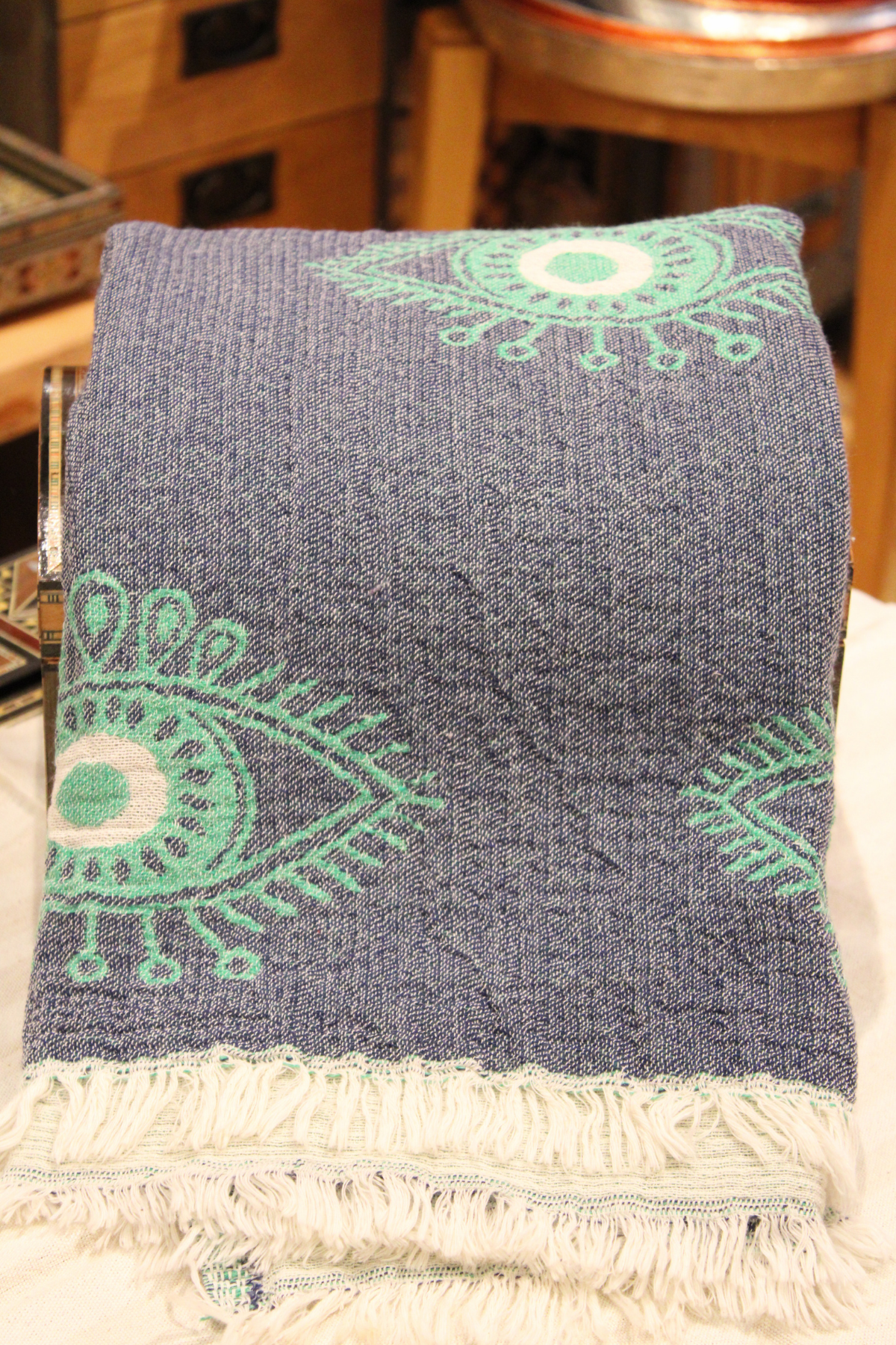 Protection Eye with Green Eye on Dark Blue Turkish Towel