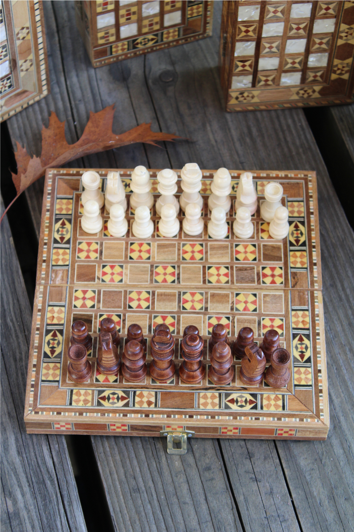 Enjoy a game with our Mini Syrian Handcrafted Mosaic Chess/Backgammon Board, featuring the Lotus motif alongside beautifully crafted chess pieces.