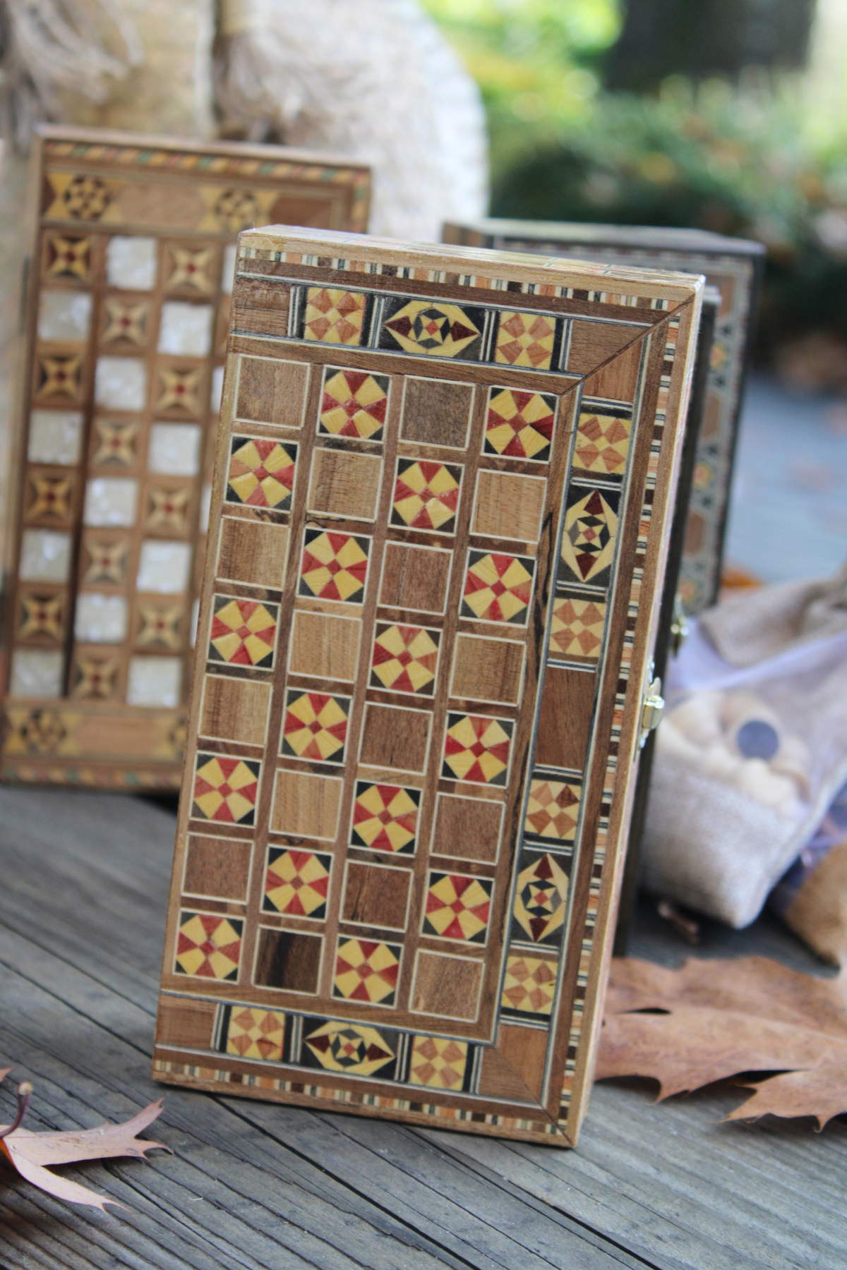 Showcase the beauty of our Mini Syrian Handcrafted Mosaic Chess/Backgammon Board with an elegant Lotus design in a stunning vertical display.