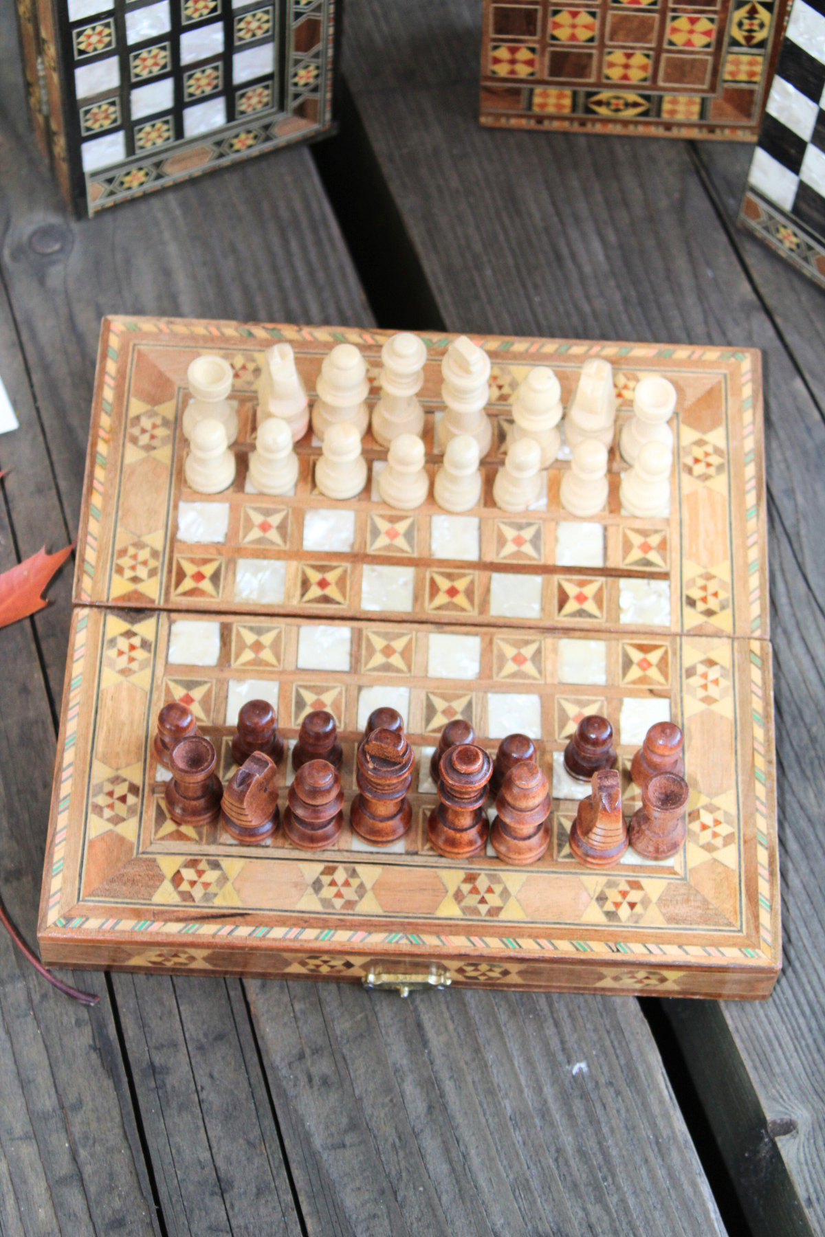 Presenting our Mini Syrian Handcrafted Mosaic Chess/Backgammon Board in an artistic display, showcasing the intricate Sparkling Blossom motif that embodies craftsmanship and elegance.