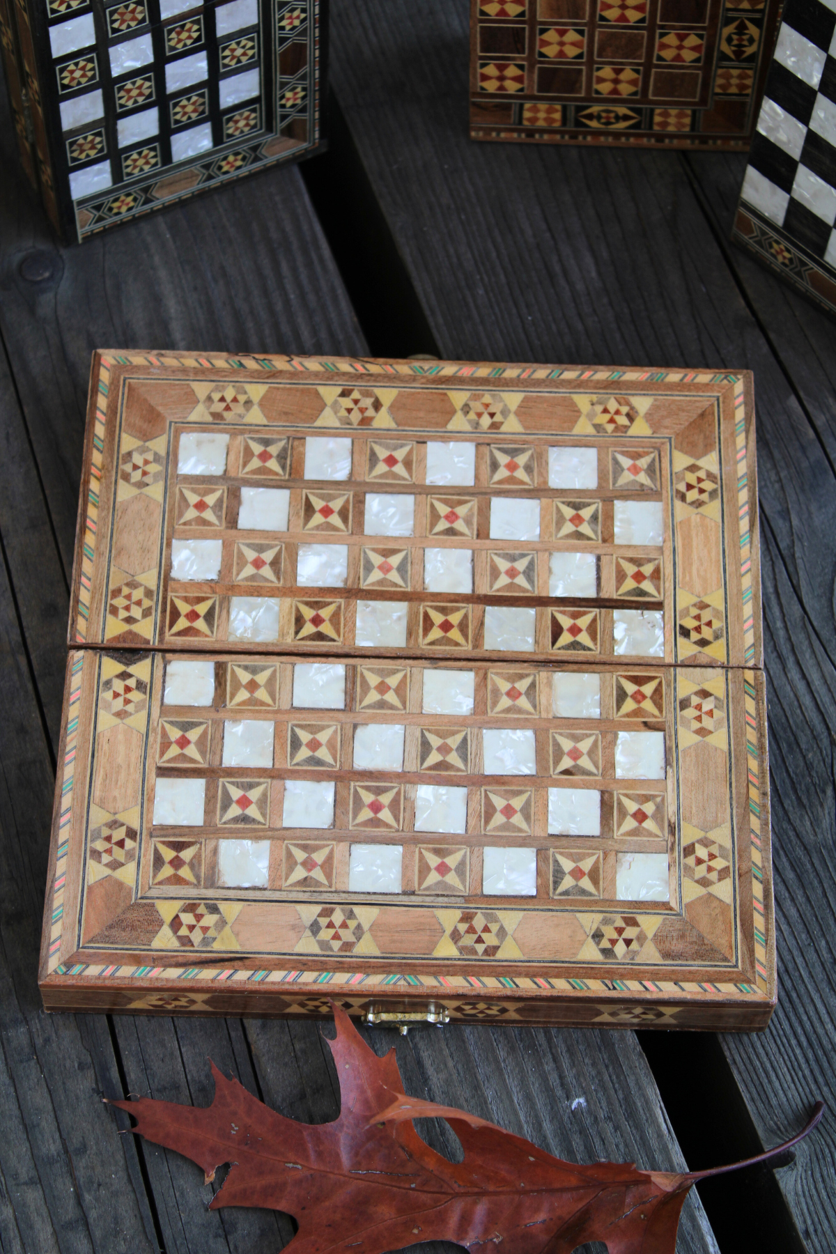 Admire the classic chess side of our Mini Syrian Handcrafted Mosaic Chess/Backgammon Board, showcasing the elegant Sparkling Blossom design.