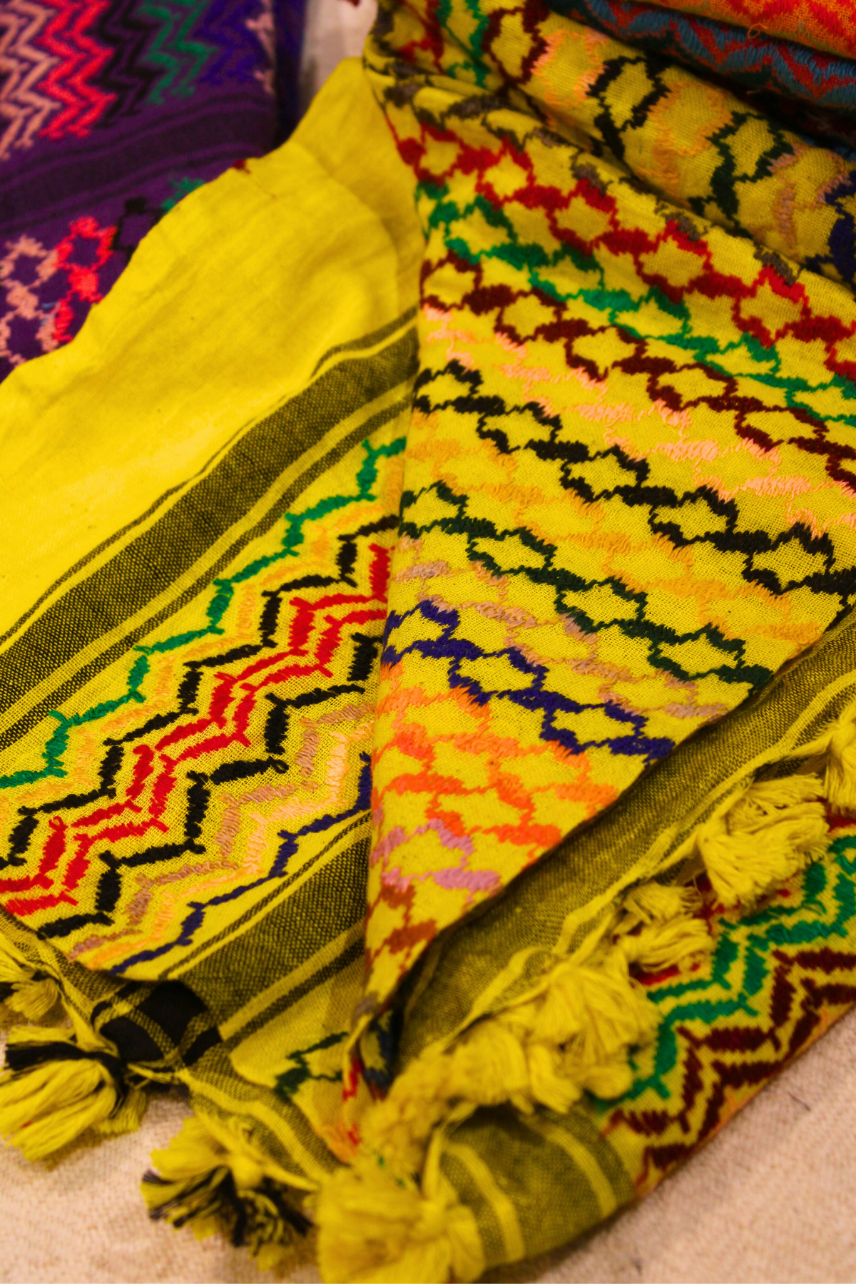 Premium cotton Keffiyeh scarf in bright lemon yellow, featuring exquisite traditional designs.