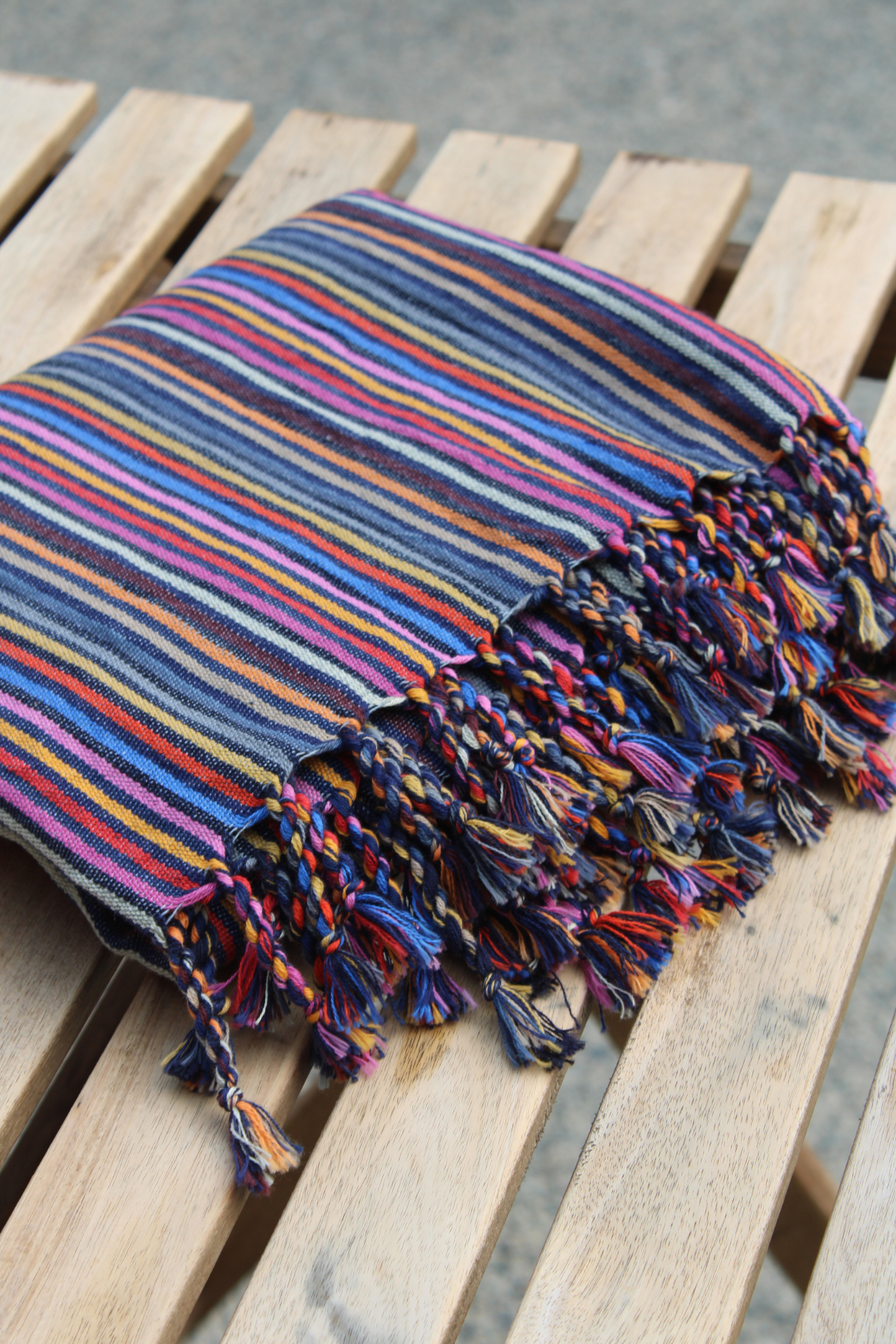 Folded Turkish cotton towel, 100% organic, pastel striped design, eco-friendly bath towel.
