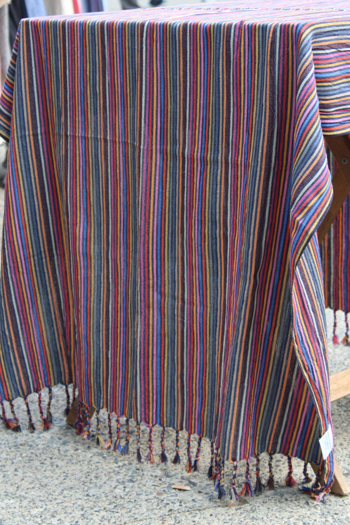 striped colourful turkish towel used as a table cloth with tassels